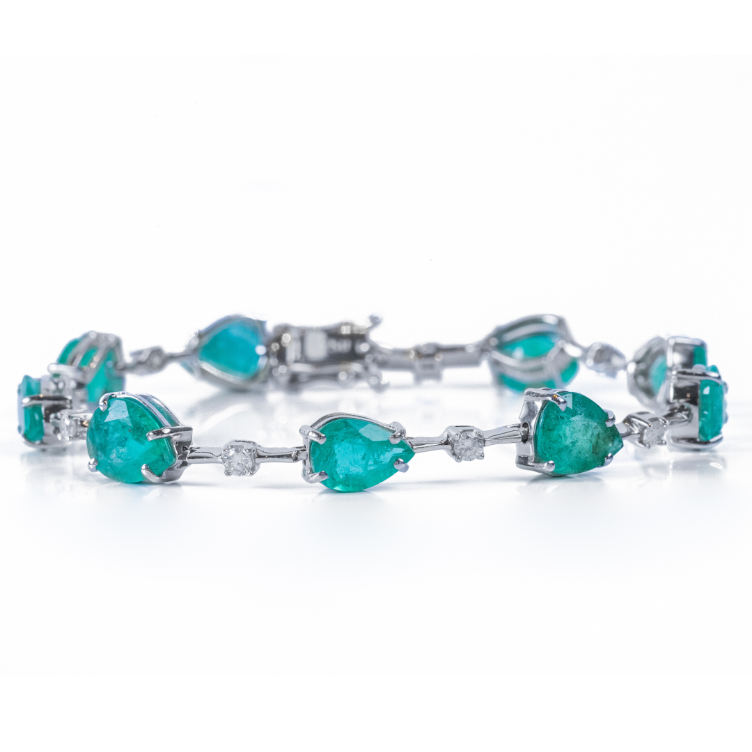 Pulseira ouro branco com brilhantes e esmeraldas