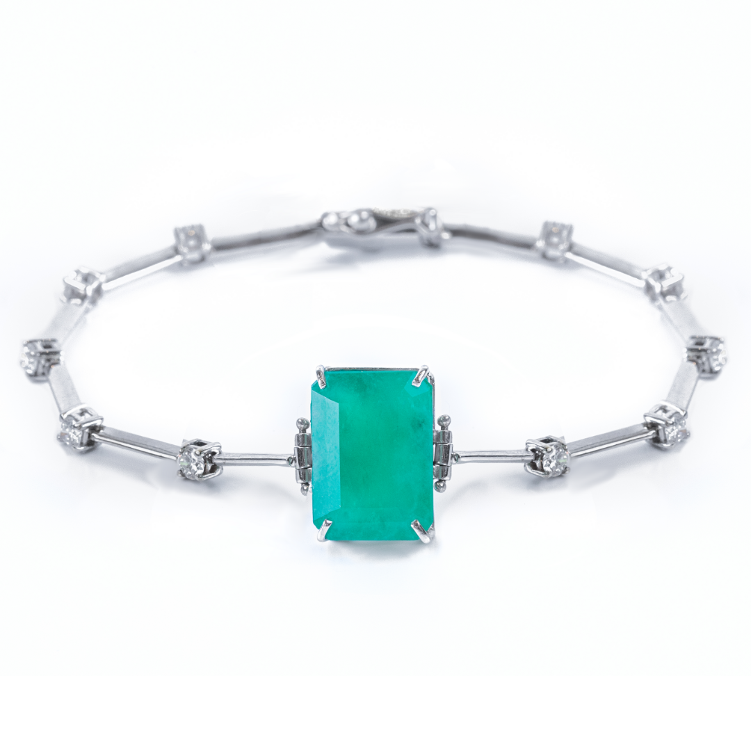 Pulseira ouro branco com brilhantes e esmeraldas